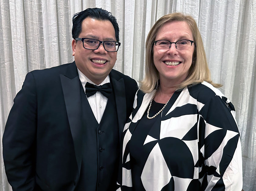 DNP student Jonathan Anotado Gapilango with Maureen Clark-Gallagher, assistant dean